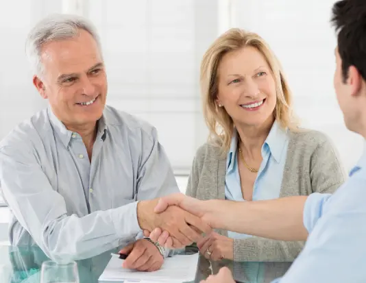 Happy old Couple Shaking hands